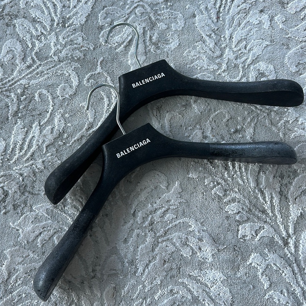 2 wooden Balenciaga hangers